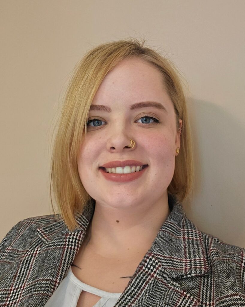 Prof Morrison-Smith is a blonde caucasian woman in her mid 30s with a bob.